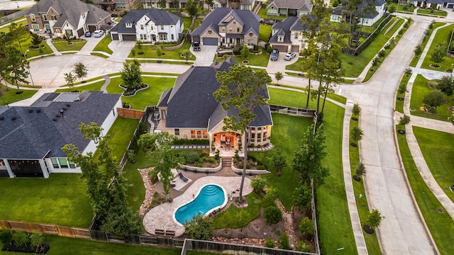 1003 Angel Forest Ct, Pinehurst, TX 77362 - aerial perspective of suburban area with a pool
