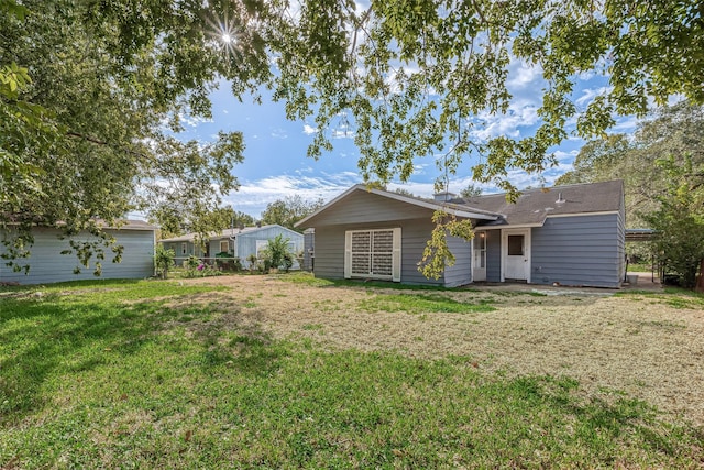 5619 Willow Glen Dr, Houston, TX 77033 - back of property featuring a lawn