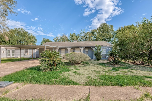 5619 Willow Glen Dr, Houston, TX 77033 - ranch-style house featuring concrete driveway and an attached carport