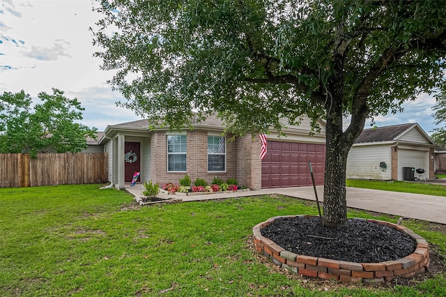 28861 Llano River Loop, Spring, TX 77386 - view of front of house with concrete driveway, a garage, and brick siding