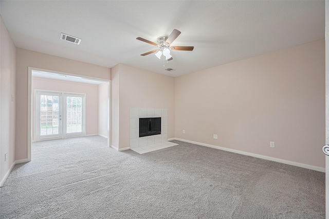 28861 Llano River Loop, Spring, TX 77386 - unfurnished living room with a ceiling fan, carpet, and baseboards