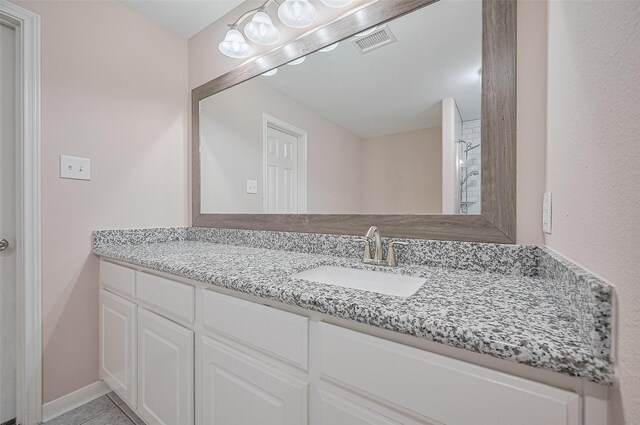 28861 Llano River Loop, Spring, TX 77386 - full bathroom with vanity and tile patterned flooring