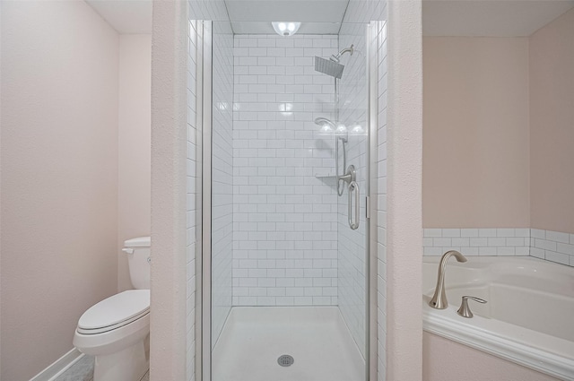 28861 Llano River Loop, Spring, TX 77386 - bathroom with a shower stall, a garden tub, and toilet