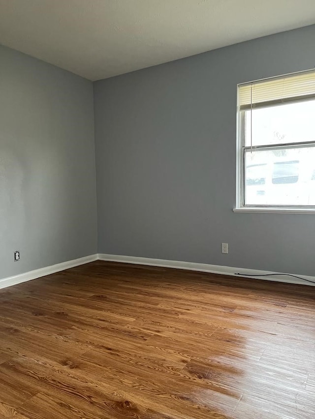 6058 Glenhurst Dr, Houston, TX 77033 - unfurnished room featuring wood finished floors and baseboards