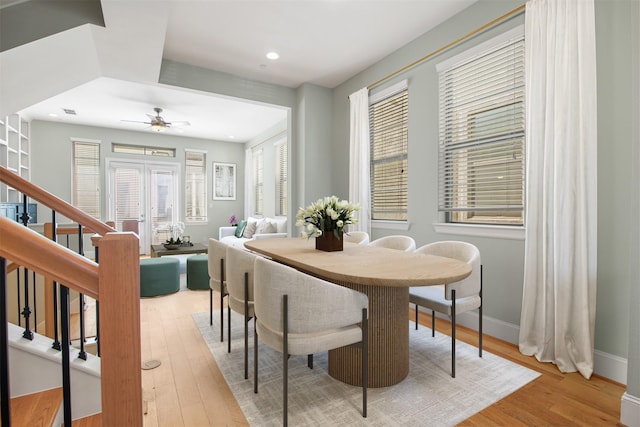 5421 Larkin St, Houston, TX 77007 - dining area featuring light wood-style floors, stairway, healthy amount of natural light, recessed lighting, and ceiling fan