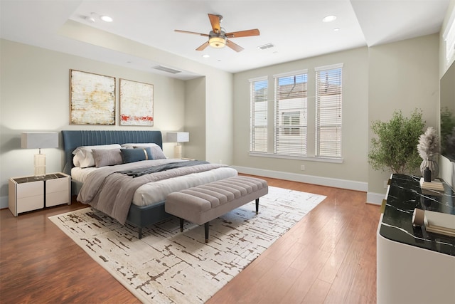 5421 Larkin St, Houston, TX 77007 - bedroom with baseboards, wood finished floors, recessed lighting, and a ceiling fan