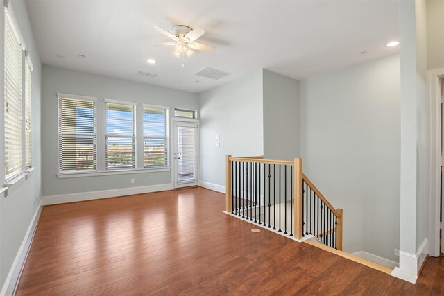 5421 Larkin St, Houston, TX 77007 - empty room with ceiling fan, wood finished floors, baseboards, and recessed lighting