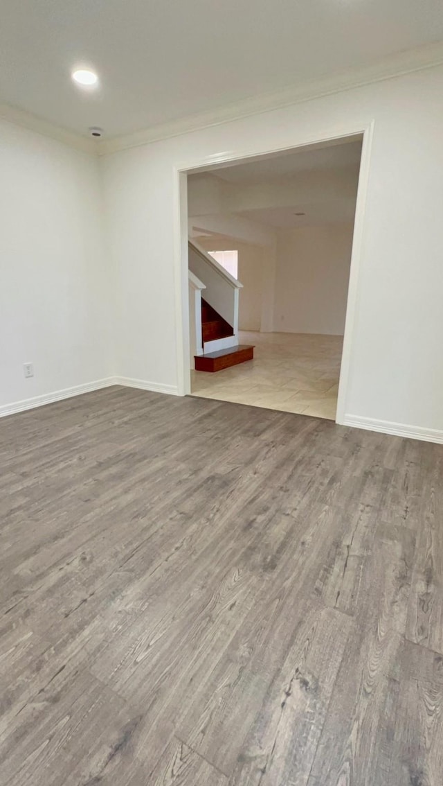 9827 Westminster Dr, Humble, TX 77338 - unfurnished room with ornamental molding, wood finished floors, baseboards, and recessed lighting
