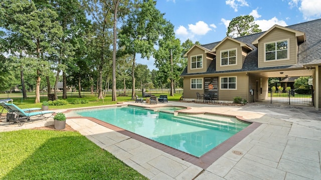 28622 Champions Dr, Magnolia, TX 77355 - view of pool featuring a patio and a pool with connected hot tub