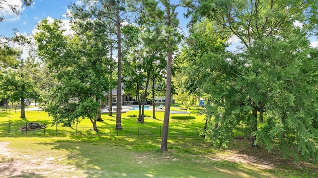 28622 Champions Dr, Magnolia, TX 77355 - view of community with a swimming pool and a trampoline