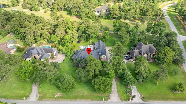 28622 Champions Dr, Magnolia, TX 77355 - aerial view of property and surrounding area featuring a tree filled landscape