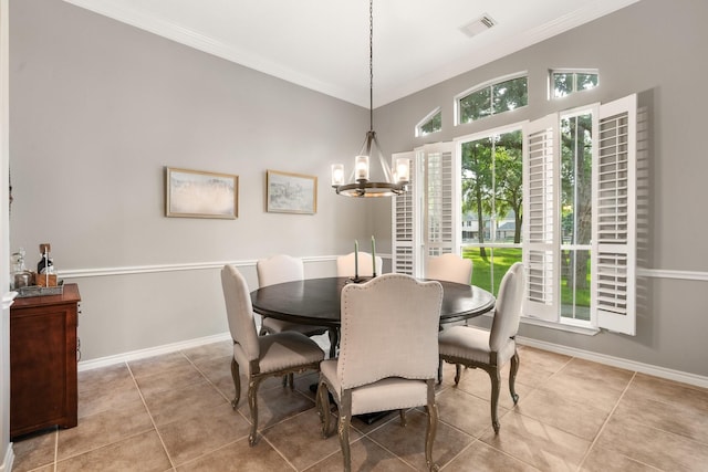 28622 Champions Dr, Magnolia, TX 77355 - dining room featuring crown molding, a chandelier, and light tile patterned flooring