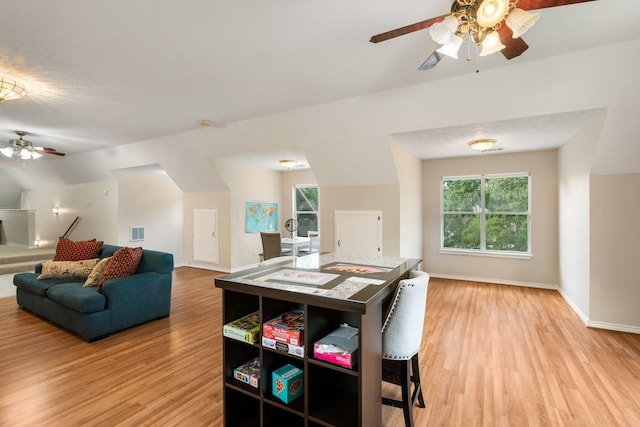 28622 Champions Dr, Magnolia, TX 77355 - dining room featuring a ceiling fan and light wood-style floors