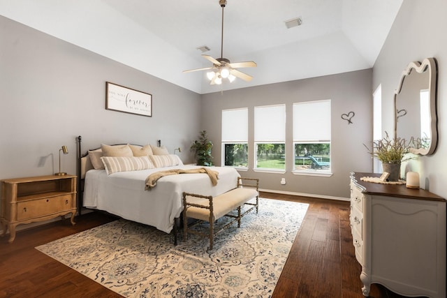 28622 Champions Dr, Magnolia, TX 77355 - bedroom featuring dark wood-style flooring, lofted ceiling, and a ceiling fan