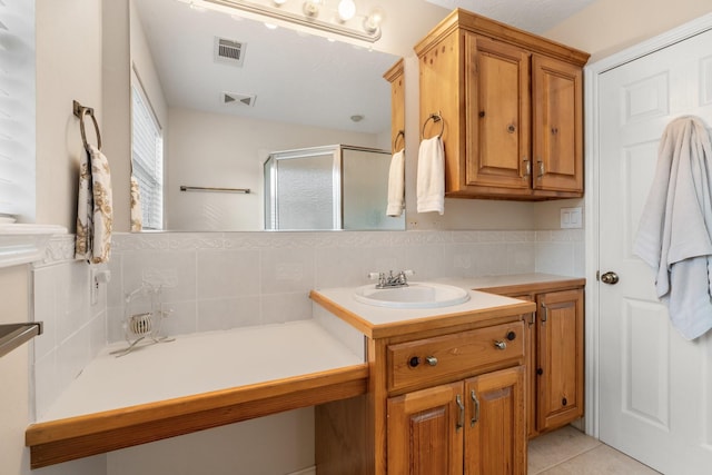 28622 Champions Dr, Magnolia, TX 77355 - bathroom featuring vanity, a shower stall, and tile patterned flooring