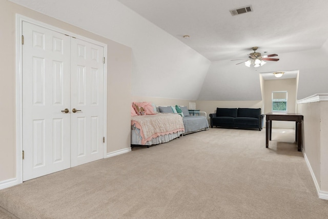 28622 Champions Dr, Magnolia, TX 77355 - bedroom featuring light carpet, vaulted ceiling, a ceiling fan, and a closet
