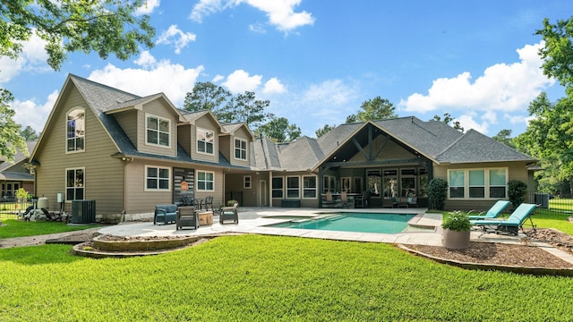 28622 Champions Dr, Magnolia, TX 77355 - back of property with a patio and roof with shingles