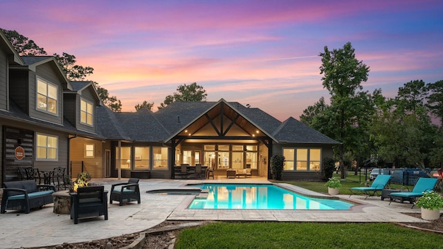 28622 Champions Dr, Magnolia, TX 77355 - view of pool featuring an outdoor living space with a fire pit, a patio, and a pool with connected hot tub