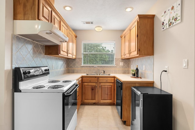 28622 Champions Dr, Magnolia, TX 77355 - kitchen featuring white electric range oven, under cabinet range hood, light countertops, refrigerator, and dishwasher