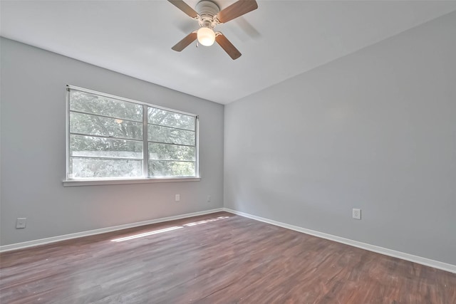 3918 Tavenor Ln, Houston, TX 77047 - empty room featuring wood finished floors, a ceiling fan, and baseboards