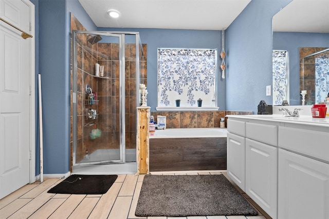 19034 Ashford Square St, Tomball, TX 77375 - bathroom with a stall shower, vanity, and a garden tub