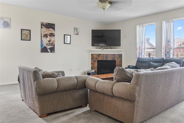 19034 Ashford Square St, Tomball, TX 77375 - carpeted living room featuring a ceiling fan and a tiled fireplace