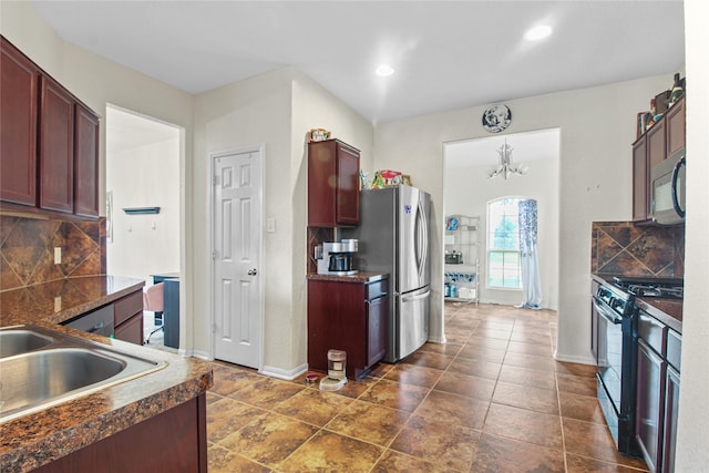 19034 Ashford Square St, Tomball, TX 77375 - kitchen featuring black appliances, dark countertops, decorative backsplash, recessed lighting, and reddish brown cabinets