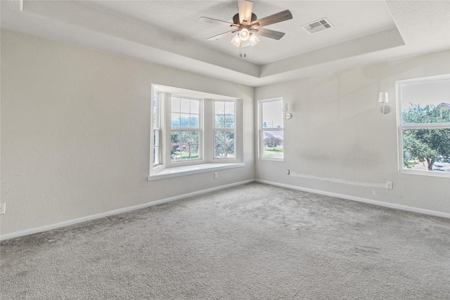 19034 Ashford Square St, Tomball, TX 77375 - carpeted empty room featuring a ceiling fan and a tray ceiling