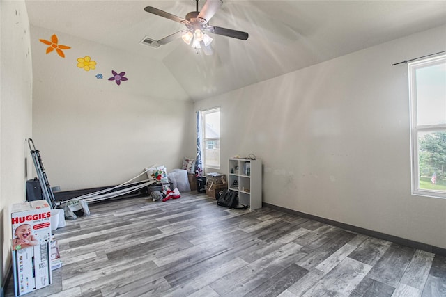 19034 Ashford Square St, Tomball, TX 77375 - spare room featuring wood finished floors, a ceiling fan, and lofted ceiling