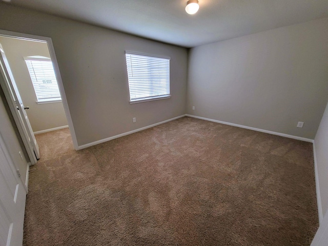24703 Allori Ct, Katy, TX 77493 - spare room with light carpet and baseboards