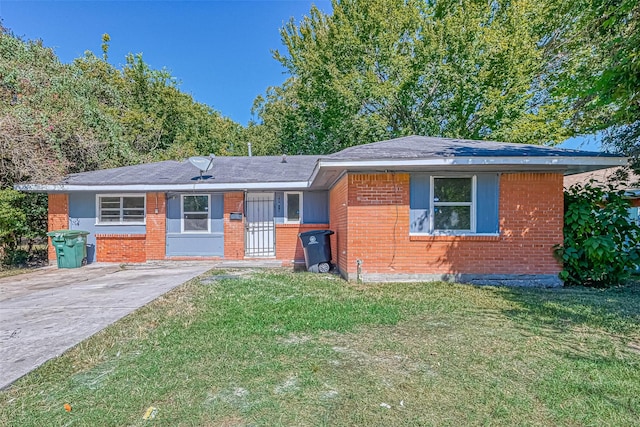 10613 Buffum St, Houston, TX 77051 - single story home featuring brick siding, a front yard, concrete driveway, and a shingled roof
