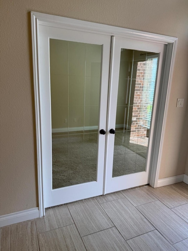 1202 Watercrest Park Ln, Rosenberg, TX 77471 - entryway featuring french doors and baseboards