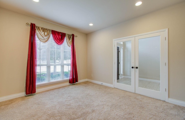 1202 Watercrest Park Ln, Rosenberg, TX 77471 - carpeted spare room with french doors, recessed lighting, and baseboards