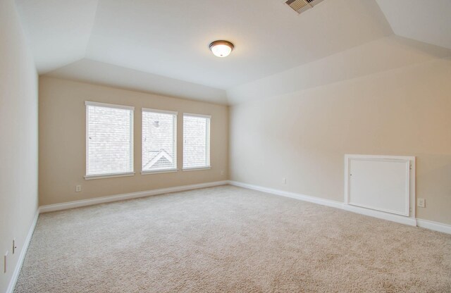 1202 Watercrest Park Ln, Rosenberg, TX 77471 - bonus room with carpet flooring, vaulted ceiling, and baseboards