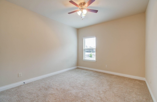 1202 Watercrest Park Ln, Rosenberg, TX 77471 - unfurnished room with light colored carpet, ceiling fan, and baseboards