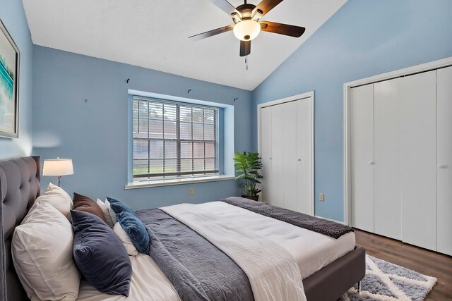 8952 Wilcrest Dr Unit 8952, Houston, TX 77099 - bedroom with two closets, vaulted ceiling, wood finished floors, and ceiling fan