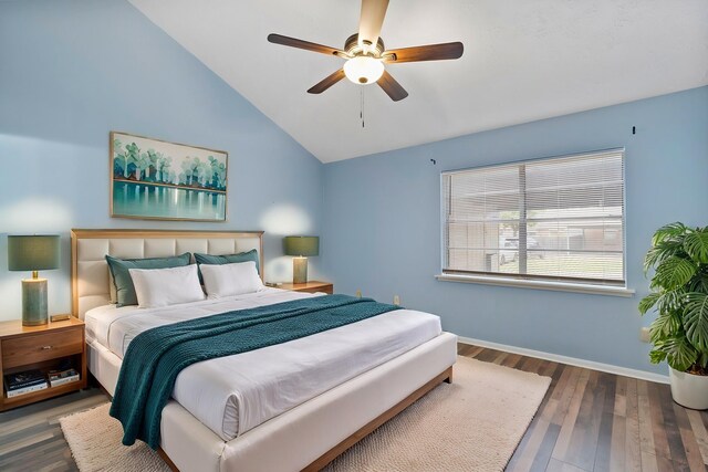 8952 Wilcrest Dr Unit 8952, Houston, TX 77099 - bedroom with lofted ceiling, wood finished floors, baseboards, and a ceiling fan
