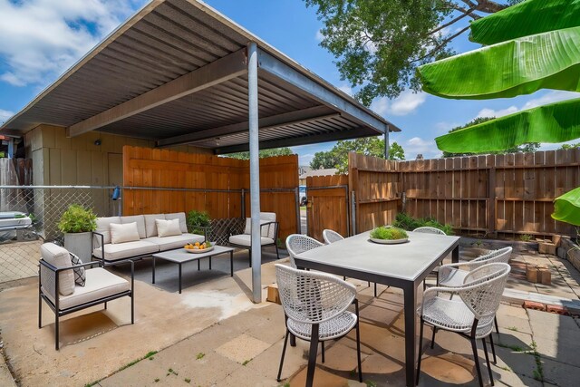 8952 Wilcrest Dr Unit 8952, Houston, TX 77099 - view of patio / terrace with outdoor lounge area and outdoor dining area
