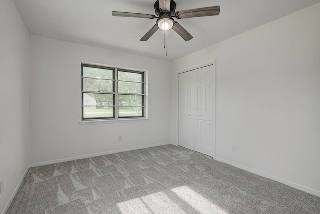229 Burkett St, Richwood, TX 77531 - unfurnished bedroom with light carpet, a closet, and ceiling fan