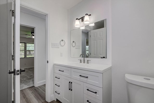 229 Burkett St, Richwood, TX 77531 - bathroom featuring wood finished floors, vanity, and ceiling fan