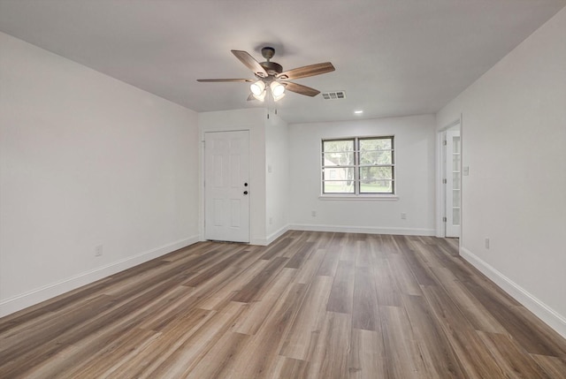229 Burkett St, Richwood, TX 77531 - empty room featuring wood finished floors and a ceiling fan