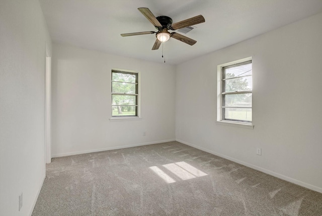 229 Burkett St, Richwood, TX 77531 - unfurnished room with carpet floors, healthy amount of natural light, and a ceiling fan