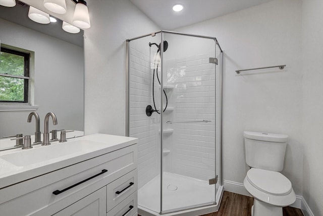 229 Burkett St, Richwood, TX 77531 - full bathroom with vanity, wood finished floors, a stall shower, and recessed lighting