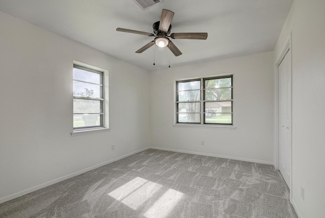 229 Burkett St, Richwood, TX 77531 - spare room with plenty of natural light, light colored carpet, and a ceiling fan