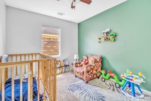 19311 Oak Station Dr, Humble, TX 77346 - bedroom with carpet flooring and ceiling fan