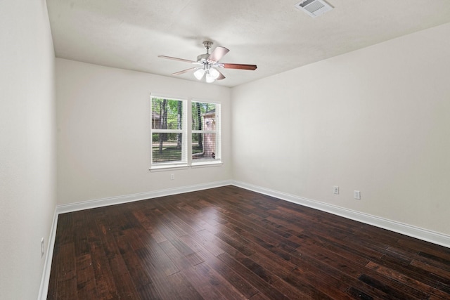 12006 Acorn Oak St, The Woodlands, TX 77380 - spare room featuring a ceiling fan, dark wood-type flooring, and baseboards