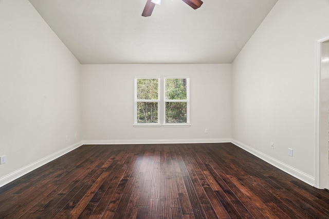 12006 Acorn Oak St, The Woodlands, TX 77380 - empty room featuring dark wood-type flooring, ceiling fan, lofted ceiling, and baseboards