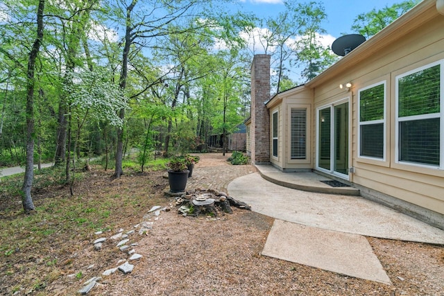 12006 Acorn Oak St, The Woodlands, TX 77380 - view of yard featuring a patio area