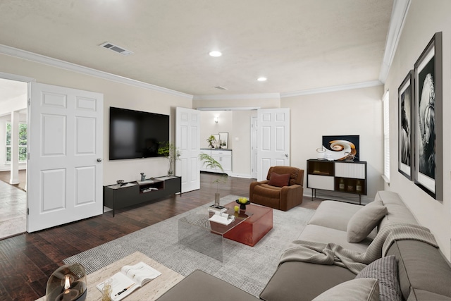 12006 Acorn Oak St, The Woodlands, TX 77380 - living room with wood finished floors, crown molding, and recessed lighting