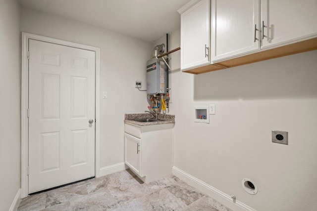 12006 Acorn Oak St, The Woodlands, TX 77380 - laundry area with electric dryer hookup, hookup for a washing machine, gas dryer hookup, baseboards, and water heater